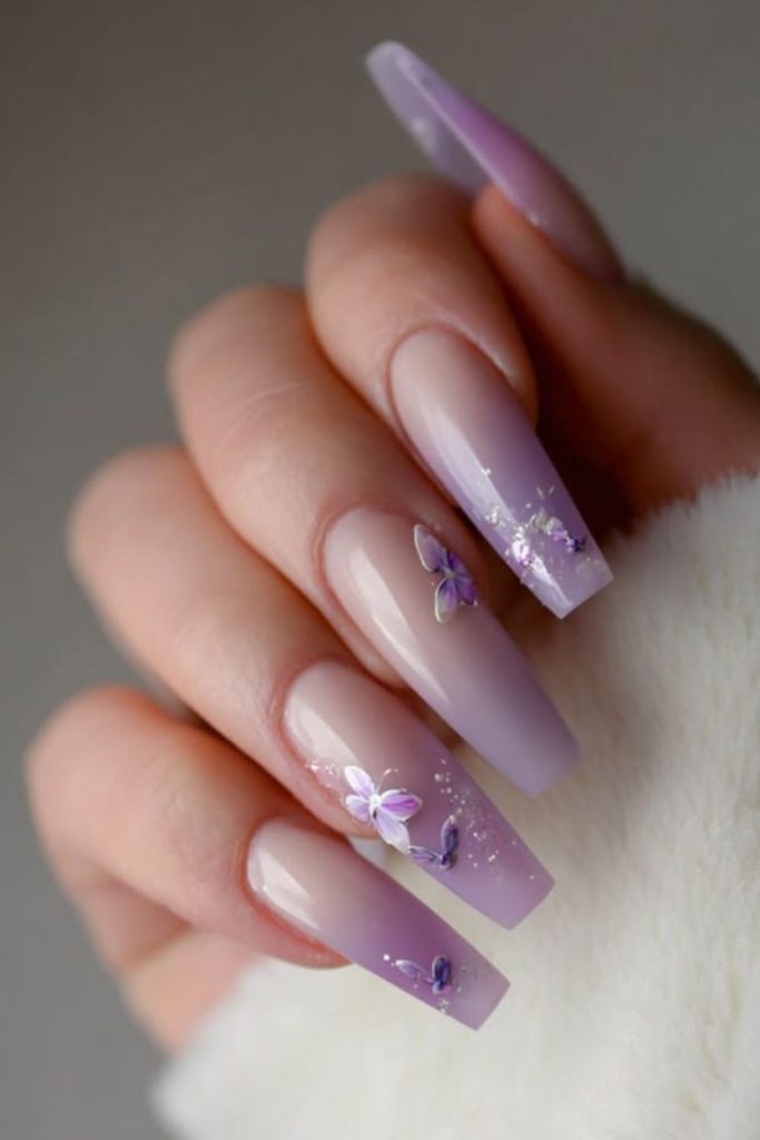 Lilac butterfly coffin nail design.