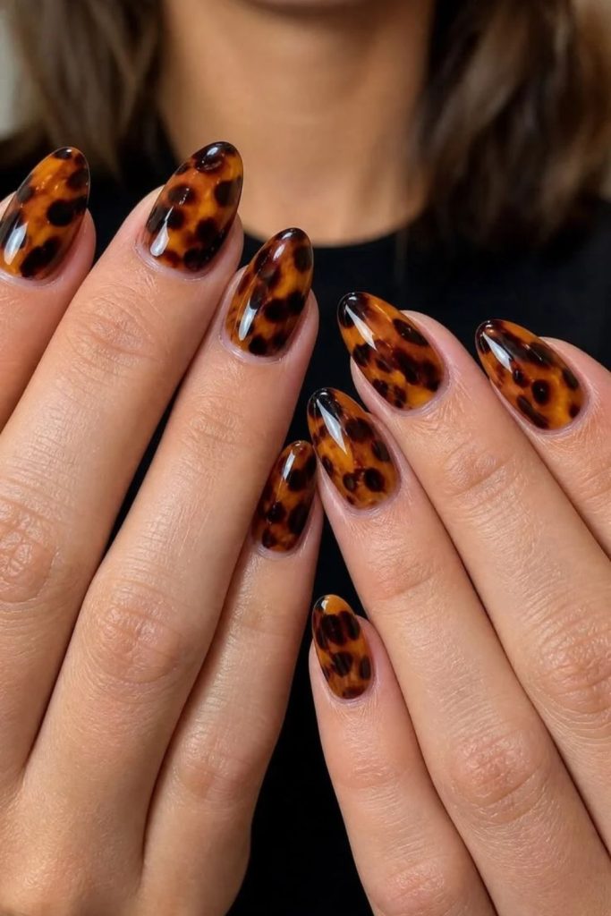 Luxe mosaic tortoiseshell statement nails.