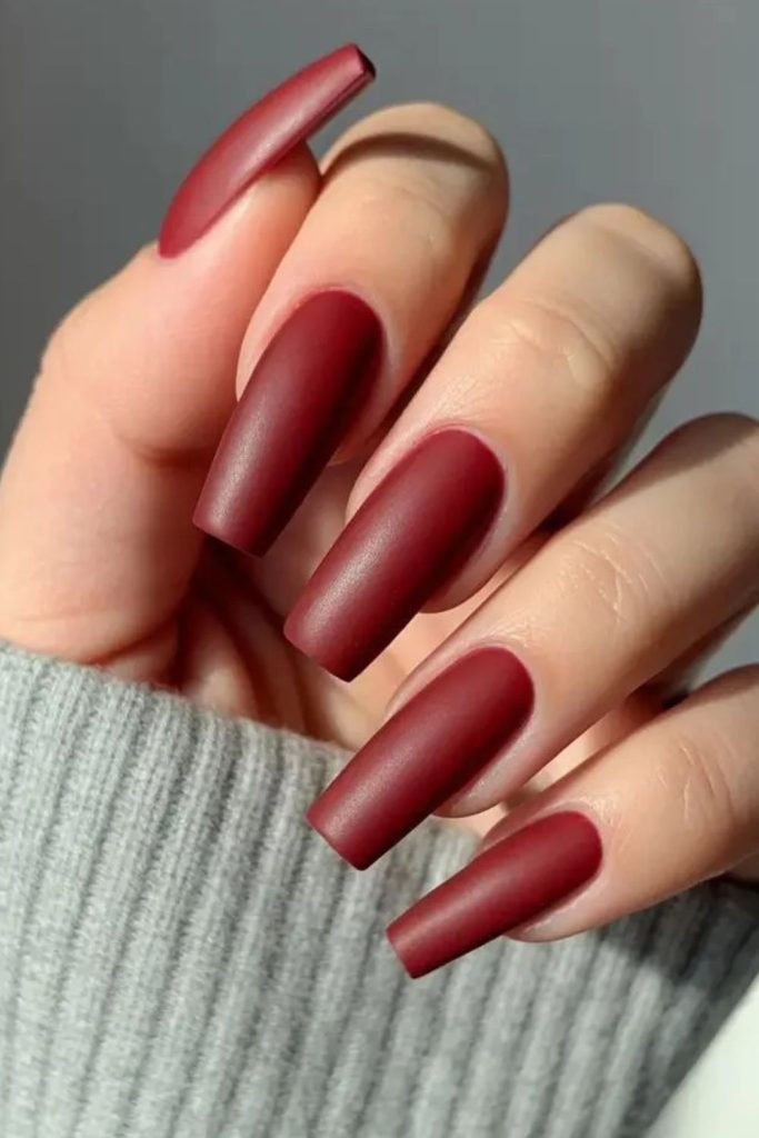 Matte cranberry nails with accents