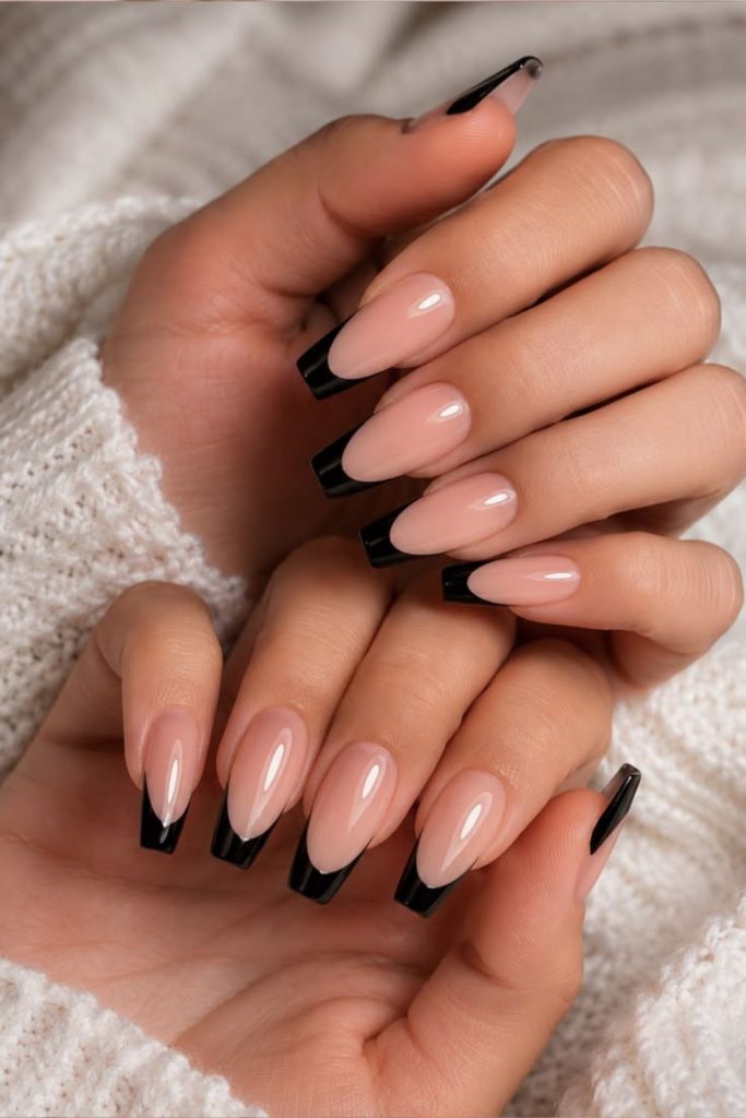Midnight French tip coffin nails.