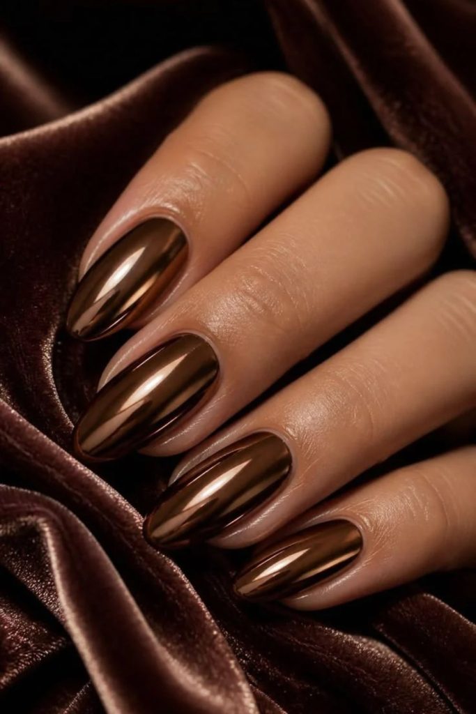 Chrome mocha nails with metallic shine.