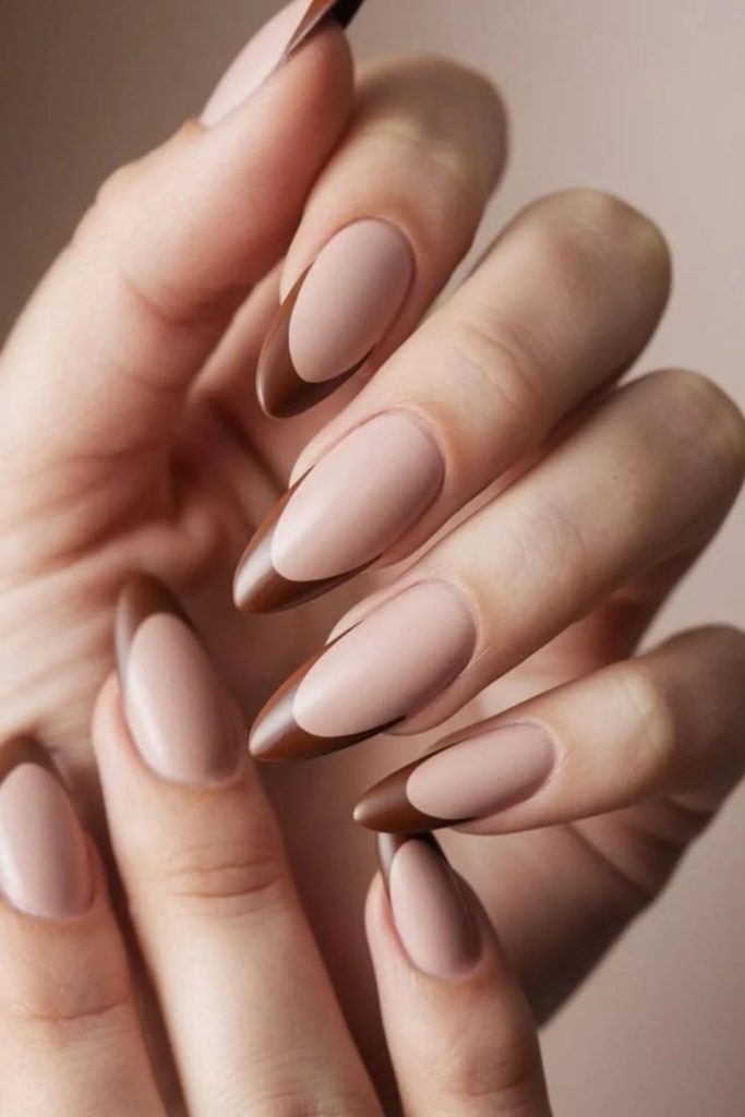 Mocha French almond nails with nude base.