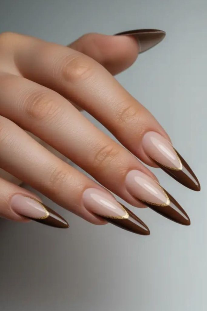 Mocha brown French stiletto nails.
