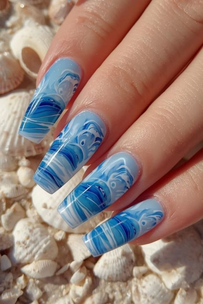 Ocean blue swirl coffin nails.