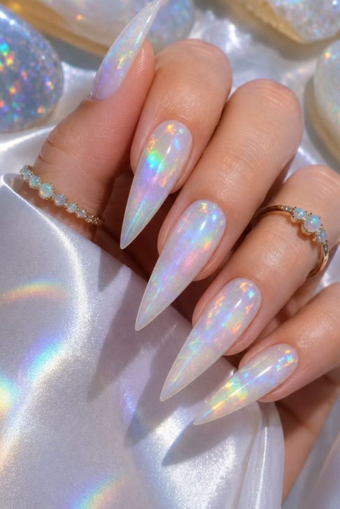 Iridescent opal fantasy stiletto nails.