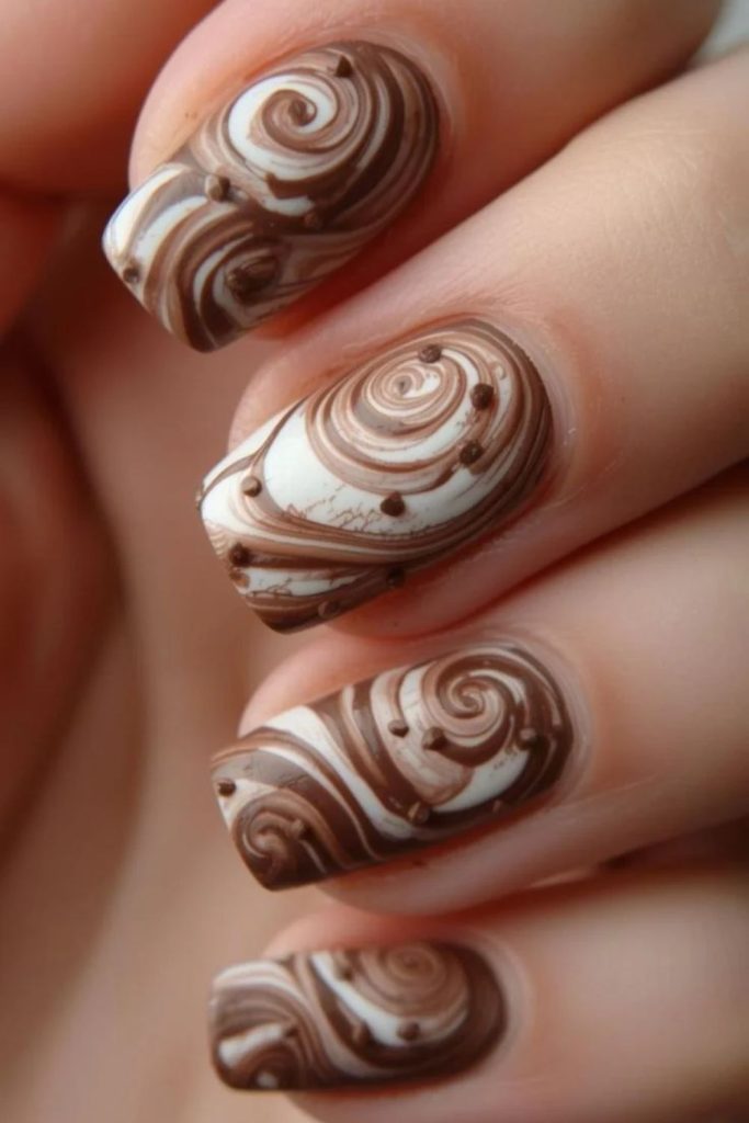 Peppermint mocha nails with festive accents.