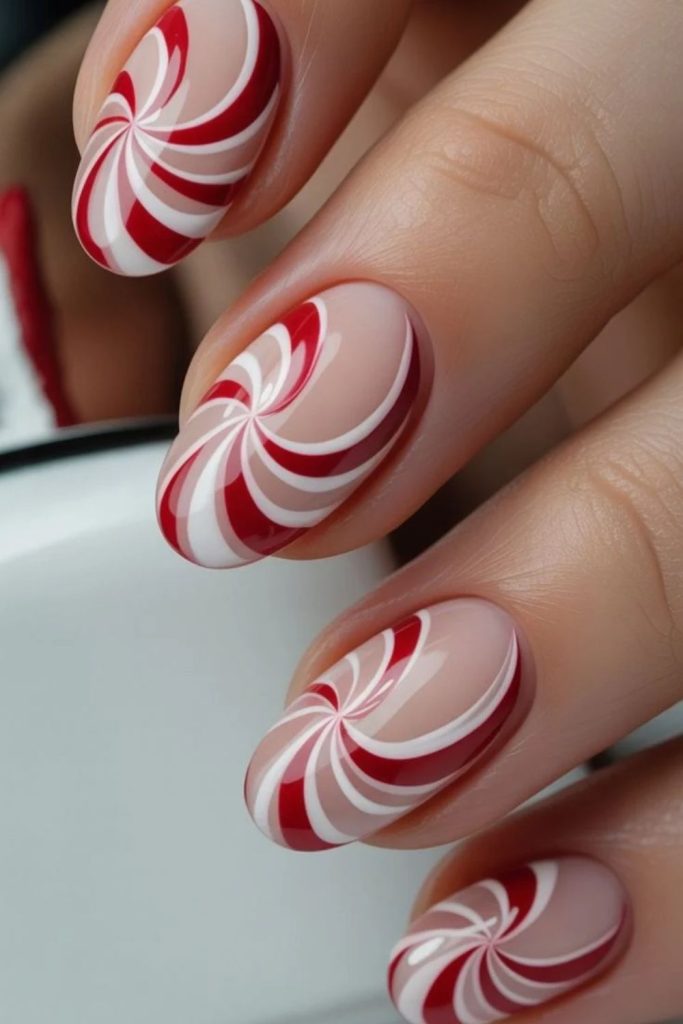 Artistic peppermint swirl marble nails.