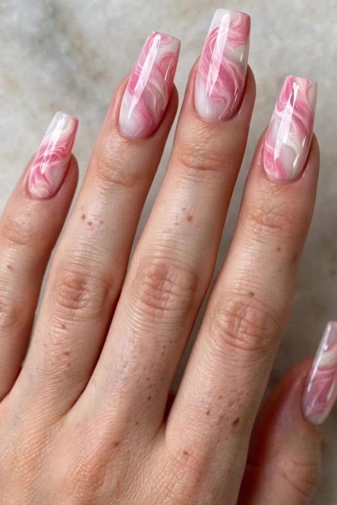 Pink candy swirl coffin nails.