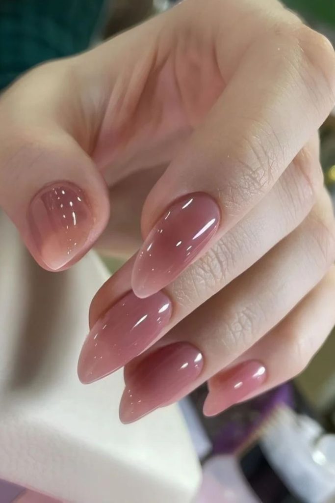 Elegant pink champagne jelly nails.