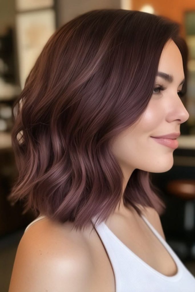 Plum champagne hair with rosy highlights.