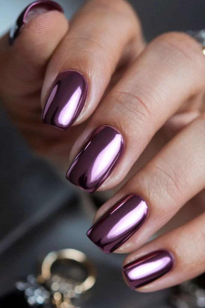 Pearlescent sugar plum shimmer nails.