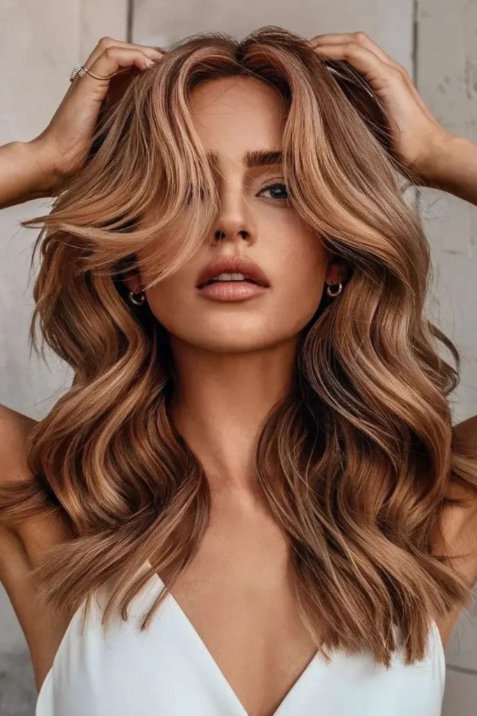 Pumpkin chai balayage with copper ribbons.