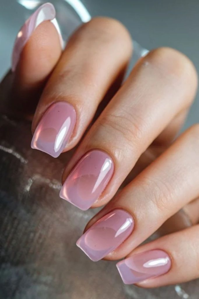 Delicate rose quartz jelly nails.