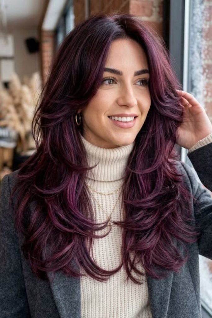 Royal plum luxurious long layered hair.