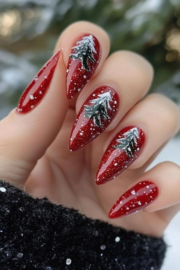 Ruby red Christmas forest nail design.