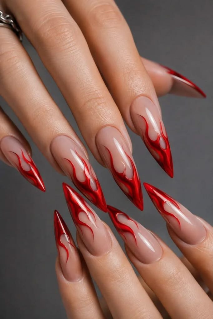 Fiery ruby red stiletto nails.