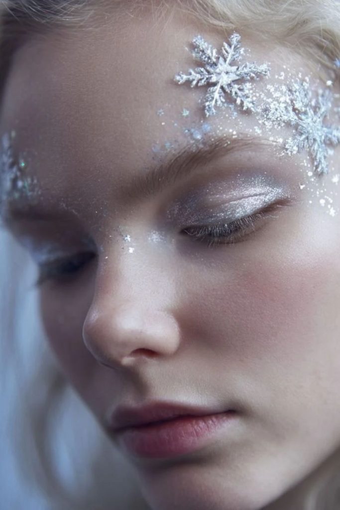 Snowflake sparkle flushed makeup look.