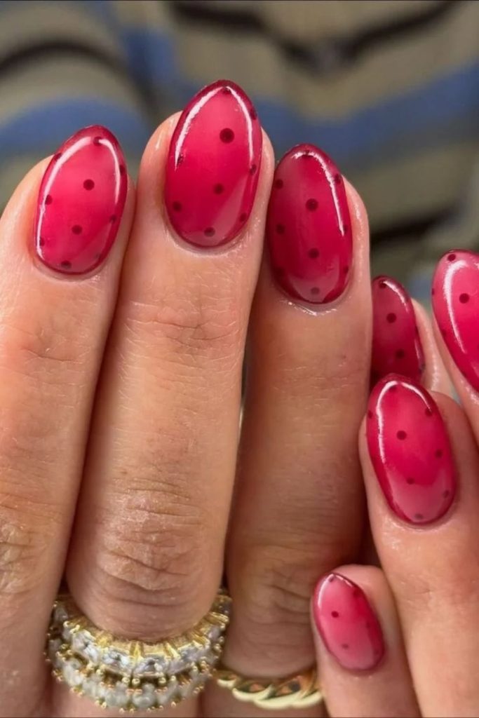 Sheer strawberry pink jelly nails.