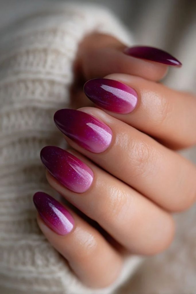 Gradient sugar plum ombré nails.