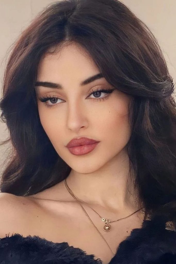 Sultry doe eyes after-dark makeup.