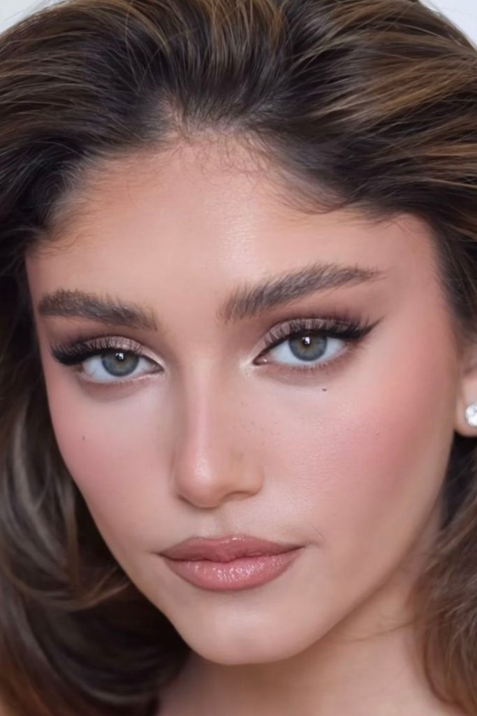 Taupe ballet doe eye makeup.