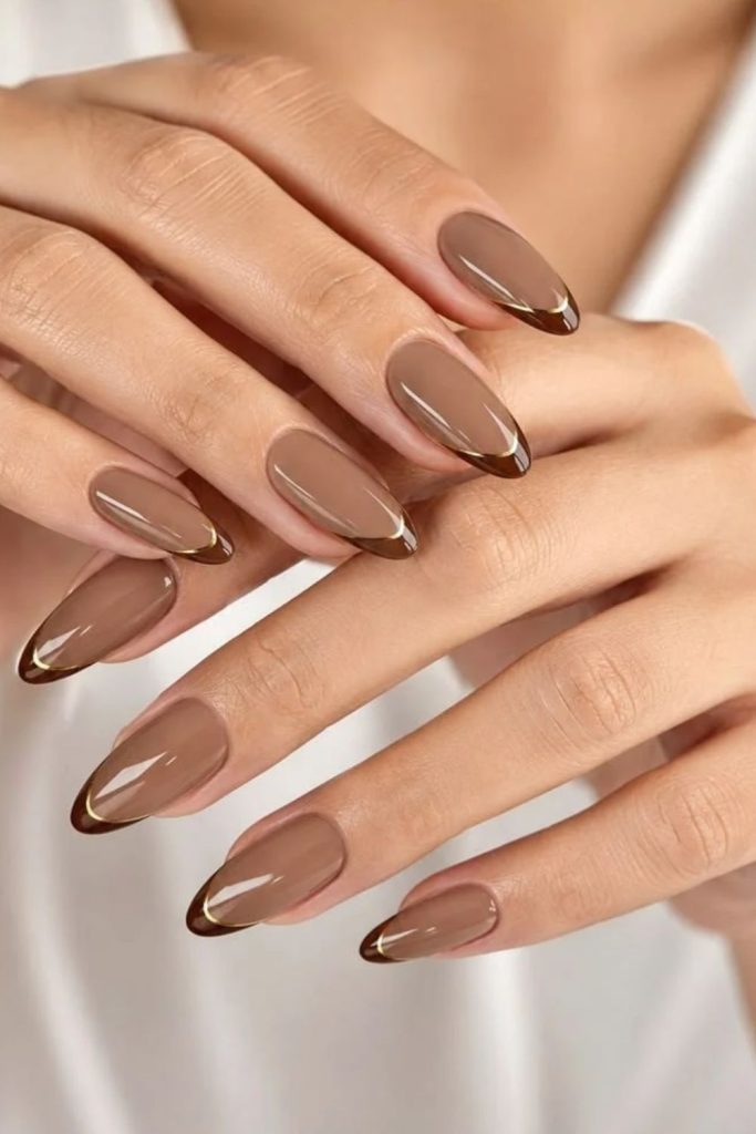 Toasted marshmallow nails with brown tips.