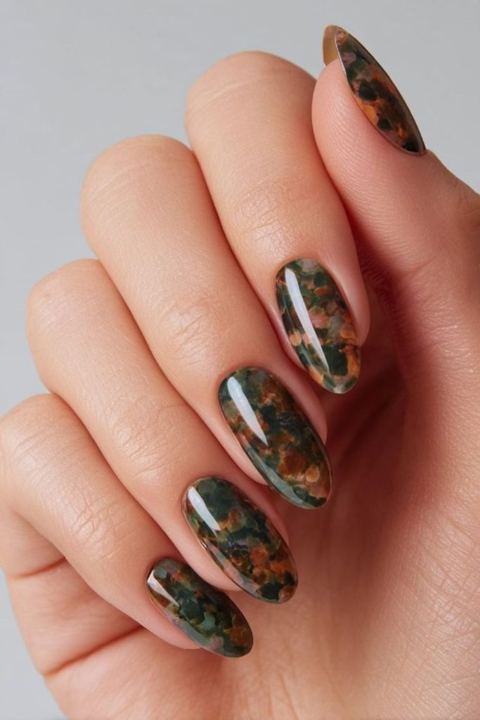 Botanical tortoiseshell mixed nail design.