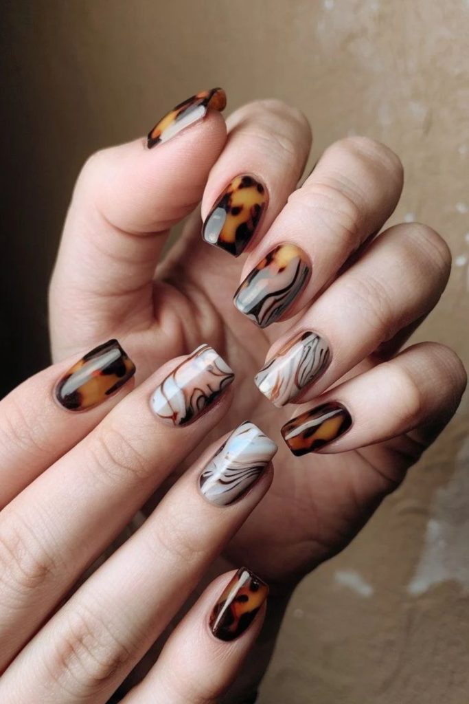 Latte swirl tortoiseshell cozy manicure.
