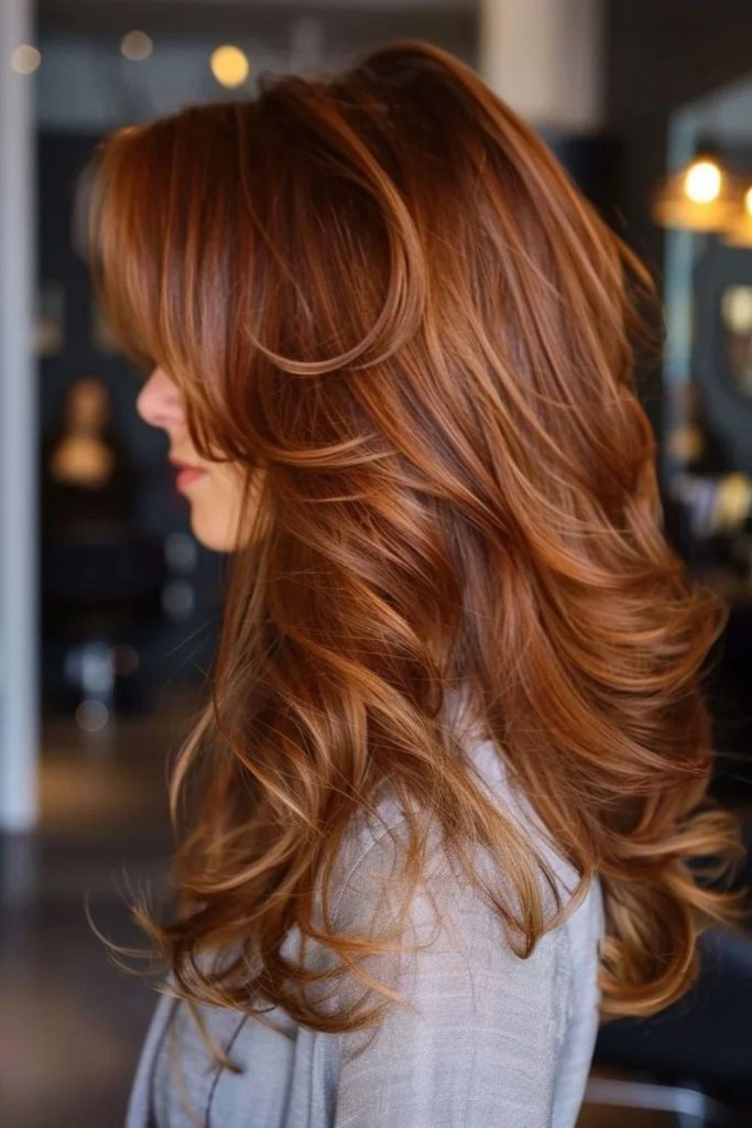 Auburn gingerbread hair with chestnut reflections.