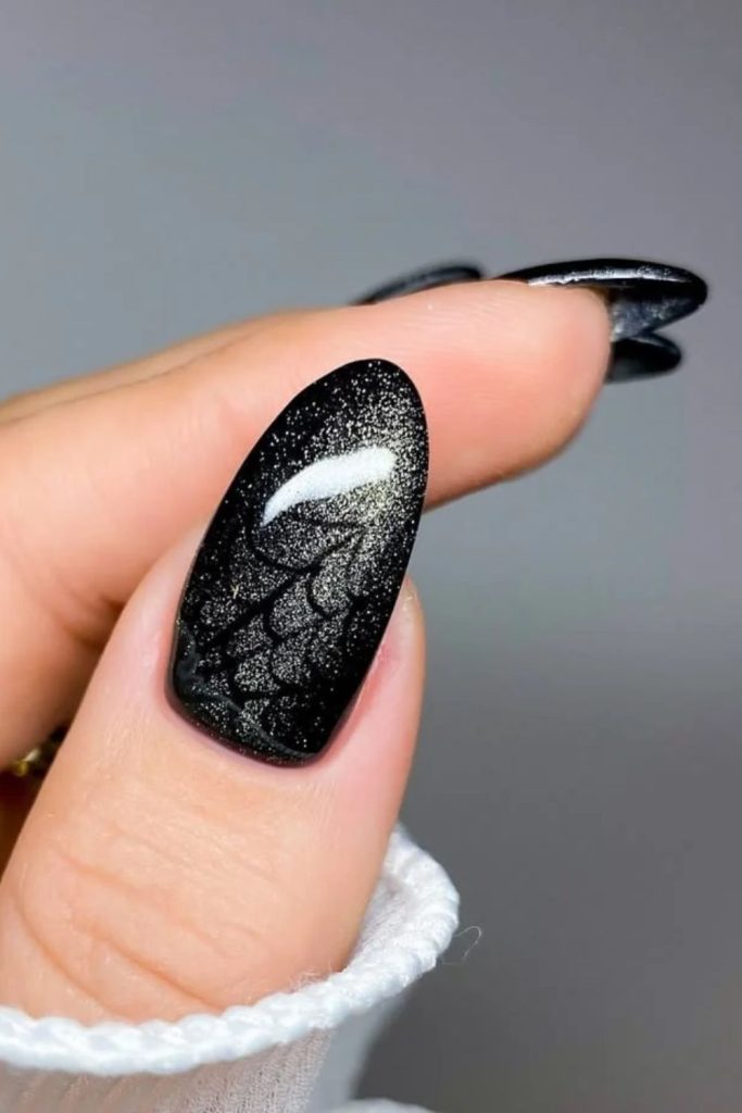 Chrome black cat nail design