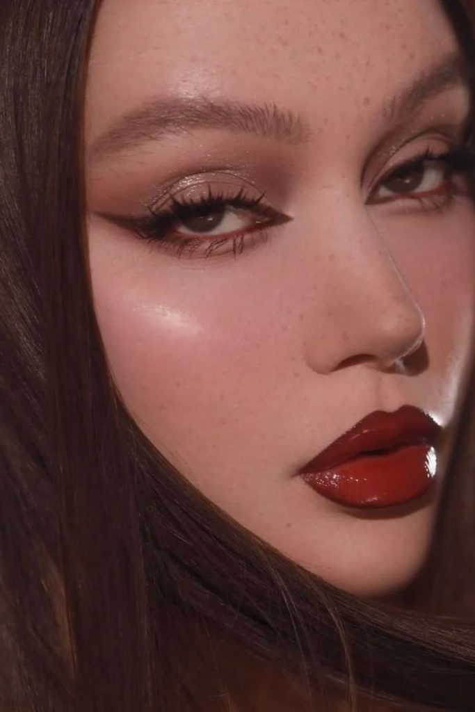 Brown liner paired with cherry lips.