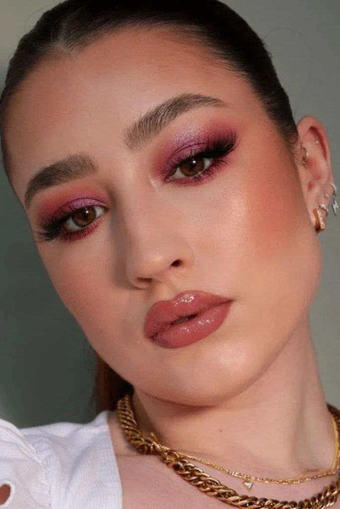 Brown and cherry halo eye makeup.