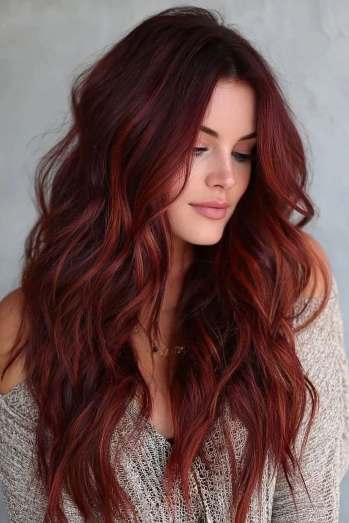 Burgundy firelight waves with warm highlights.