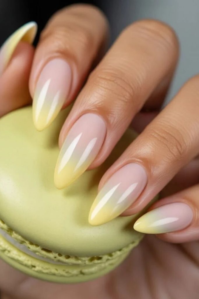 Butter yellow French tip manicure design.