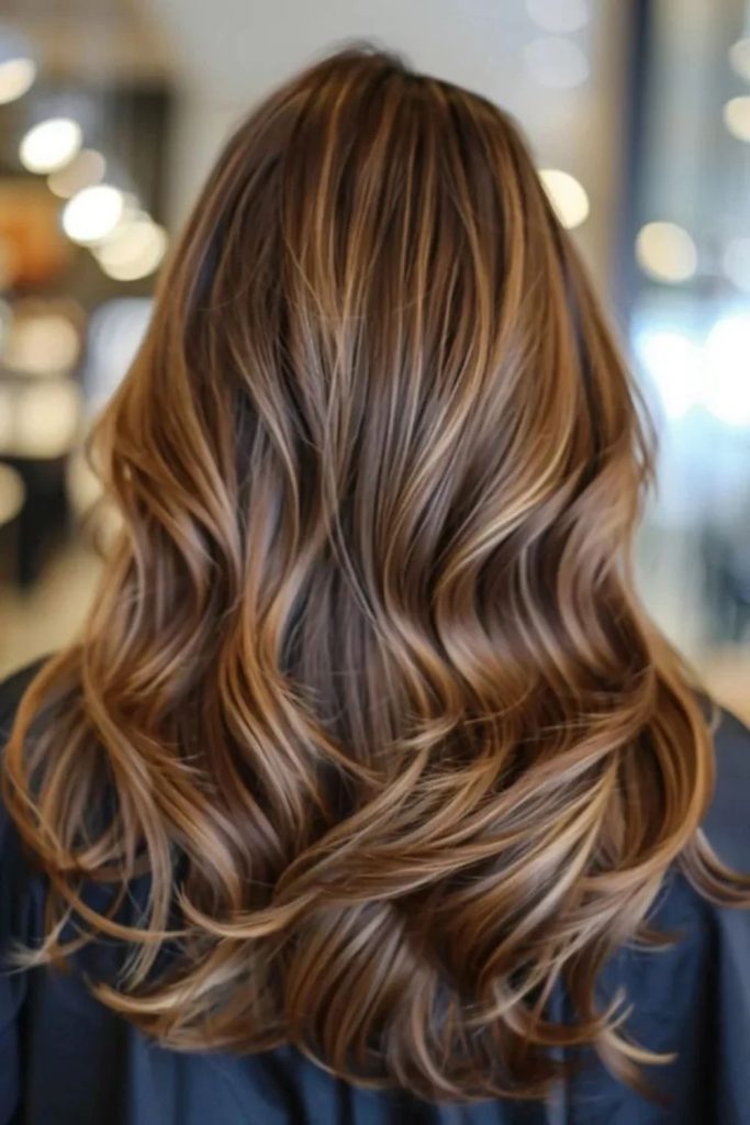 Chocolate brown hair with butterscotch highlights.