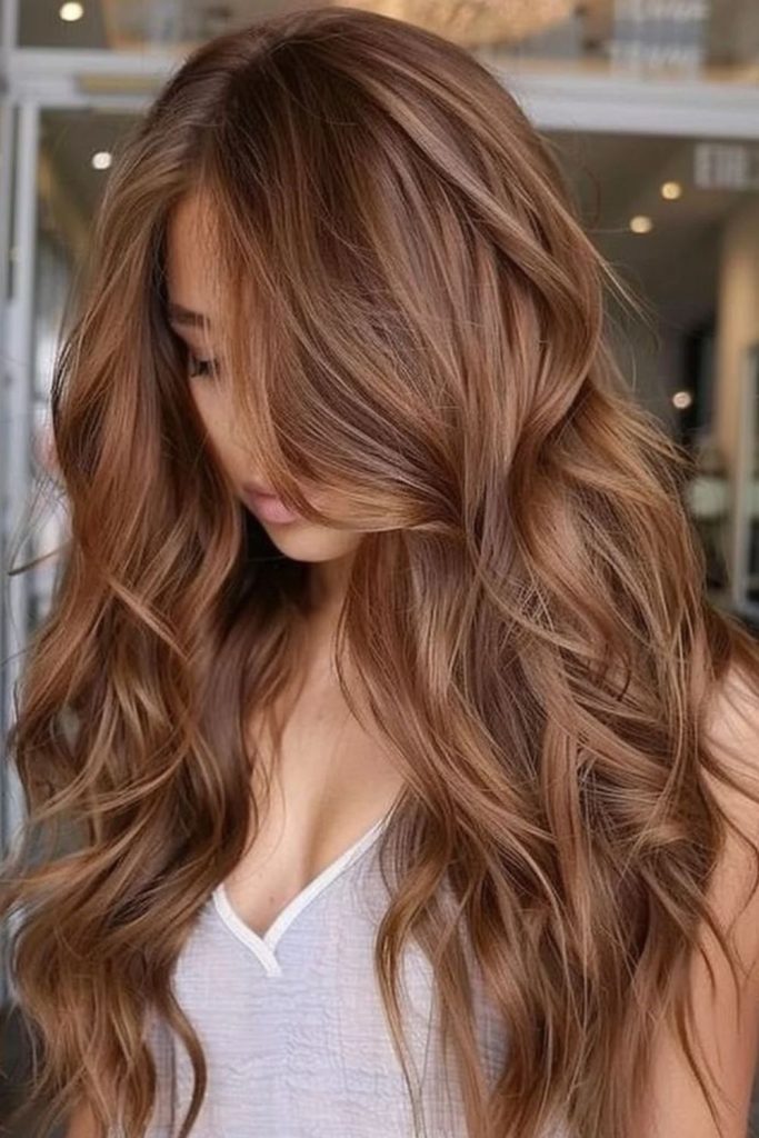 Butterscotch mocha hair with caramel reflections.
