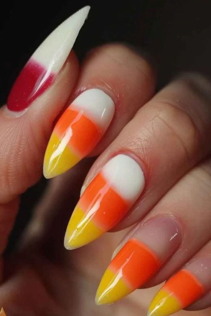 Velvet yellow orange and ivory candy corn nails.