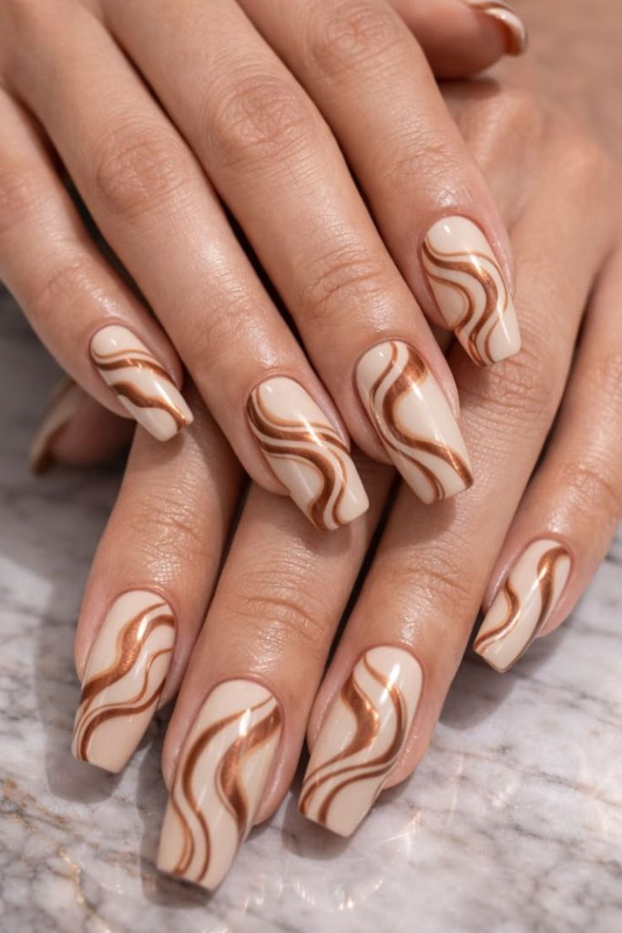 Champagne Brown Swirl Nails with Caramel Accents.