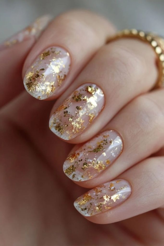 Champagne Gold Foil Nails with Metallic Flakes.