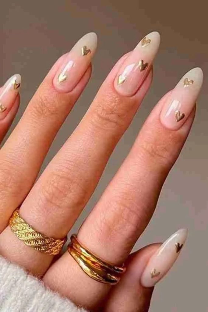 Champagne Heart Nails with Romantic Golden Details.