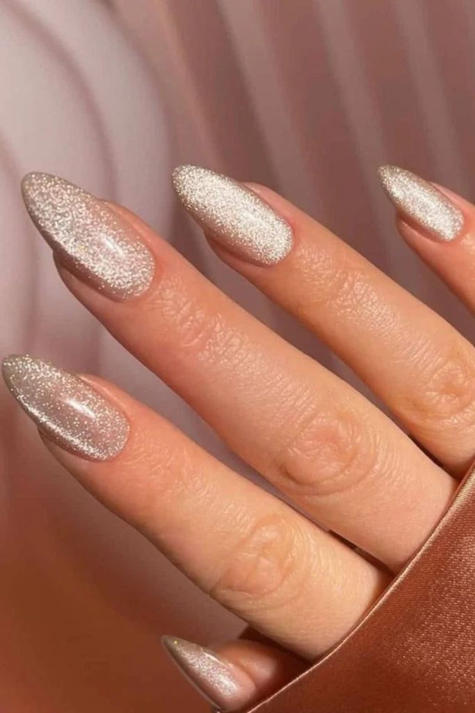 Champagne Satin Nails with Soft Luminous Finish.