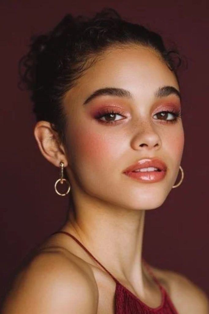 Cherry cola sunset eyes with warm shadows.