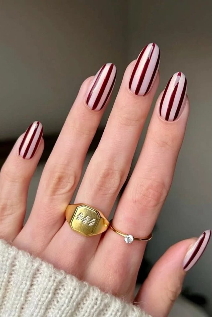 Cherry mocha nails with candy stripes.
