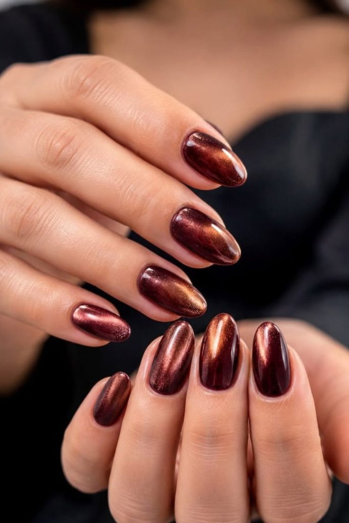 Glossy cherry mocha almond nails.