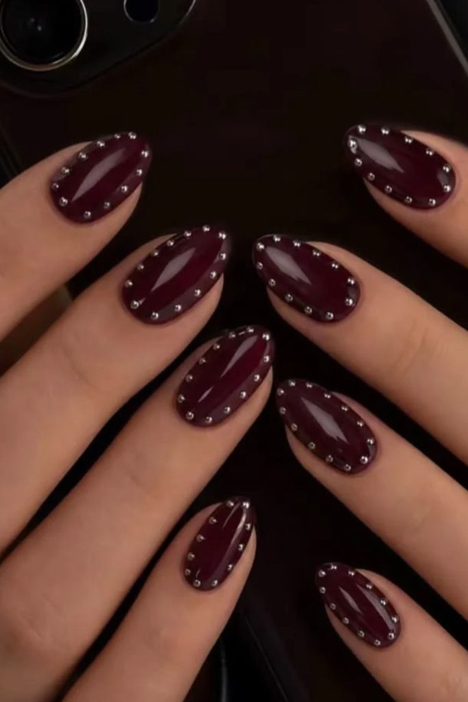 Cherry mocha nails with crystal rhinestones.