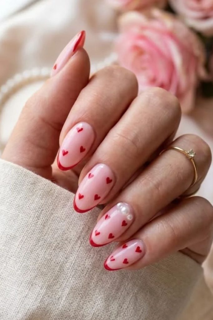 Heart French coquette nails with romantic details.