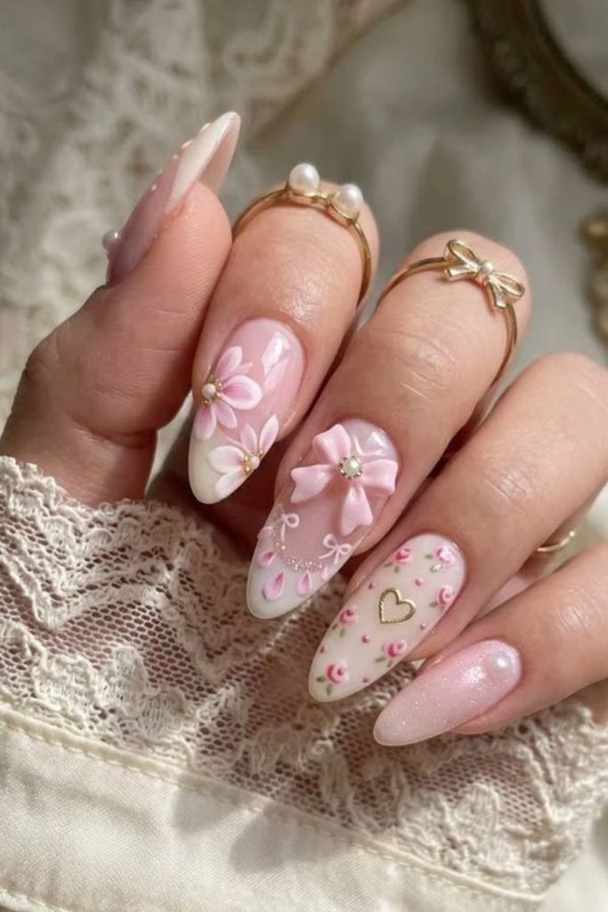 Pressed flower coquette nails with delicate bows.