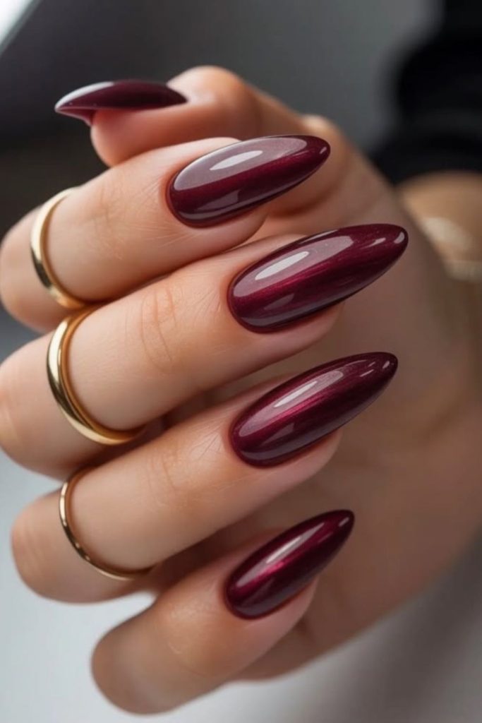 Deep burgundy mocha glossy nail polish.