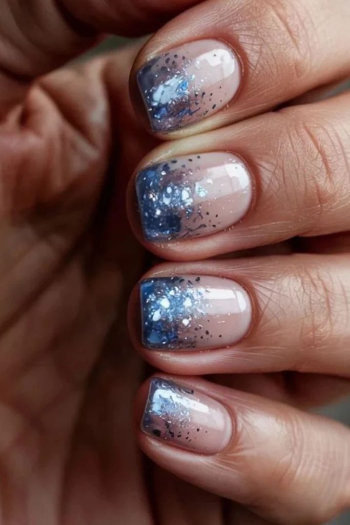 Disco ombre nails with fading silver glitter.