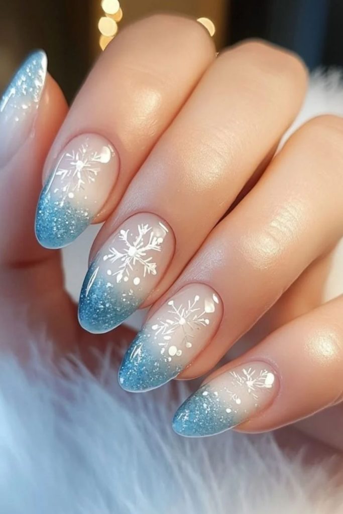 Frozen powder blue ombre ski nails.